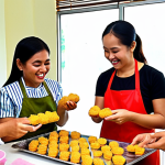 **

A vibrant workshop scene inside a koperasi. Focus on hands-on activity: women learning to make "kuih raya" (traditional Malay cookies) from a skilled instructor. Ingredients and baking tools are visible. Emphasize the cooperative spirit, with smiles and interaction between participants. In the background, a banner with the koperasi's name. The style should be realistic and inviting, showcasing the joy of learning and community.

**